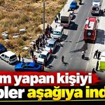 Eylem yapan kişiyi ekipler aşağıya indirdi