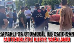 Kapaklı'da otomobil ile çarpışan motosikletli kurye yaralandı