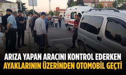 Arıza yapan aracını kontrol ederken ayaklarının üzerinden otomobil geçti