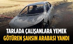 Tarlada çalışanlara yemek götüren şahsın arabası yandı