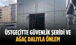 Üstgeçitte güvenlik şeridi ve ağaç dalıyla önlem