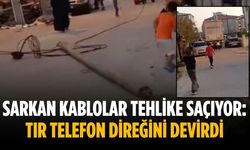 Sarkan kablolar tehlike saçıyor: Tır telefon direğini devirdi