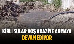 Kirli sular boş araziye akmaya devam ediyor