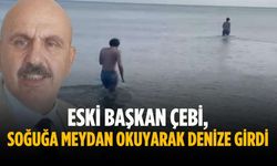 Eski Başkan Çebi, soğuğa meydan okuyarak denize girdi
