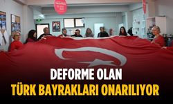 Deforme olan Türk bayrakları onarılıyor