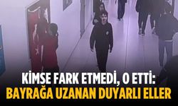 Kimse fark etmedi, o etti: Bayrağa uzanan duyarlı eller