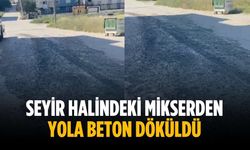 Seyir halindeki mikserden yola beton döküldü