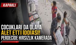 Çocukları da olaya alet etti: Perdecinin önündeki ürünleri çaldı