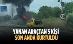 Yanan araçtan 5 kişi son anda kurtuldu