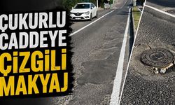 “Çukurlu caddeye çizgili makyaj”