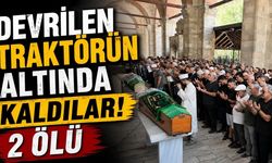 Devrilen traktörün altında kaldılar: 2 ölü