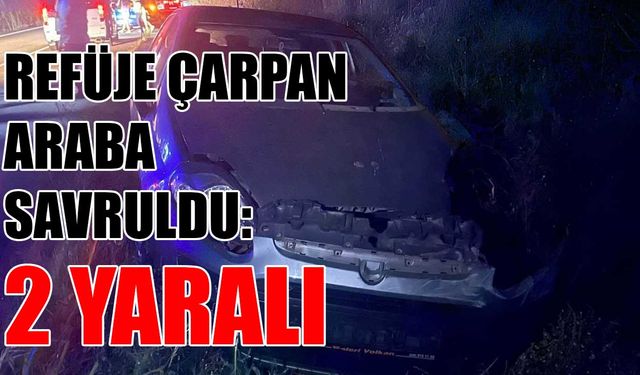 Refüje çarpan otomobil savruldu: 2 yaralı