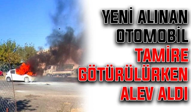 Yeni alınan otomobil tamire götürülürken alev aldı