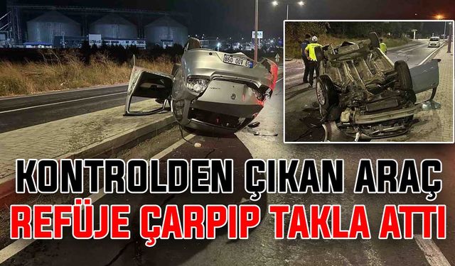 Kontrolden çıkan araç refüje çarpıp takla attı