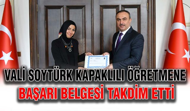 Vali Soytürk Kapaklılı öğretmene başarı belgesi takdim etti