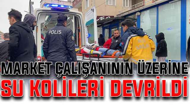 Market çalışanının üzerine su kolileri devrildi