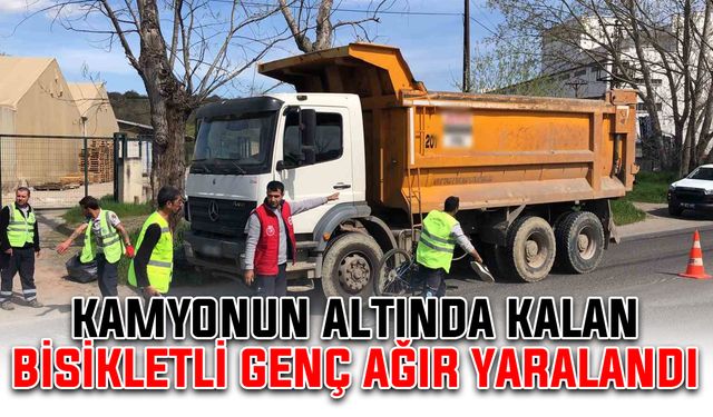 Kamyonun altında kalan bisikletli genç ağır yaralandı