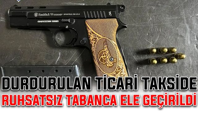 Durdurulan ticari takside ruhsatsız tabanca ele geçirildi