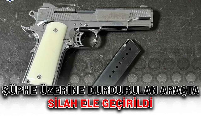 Şüphe üzerinde durdurulan araçta silah ele geçirildi