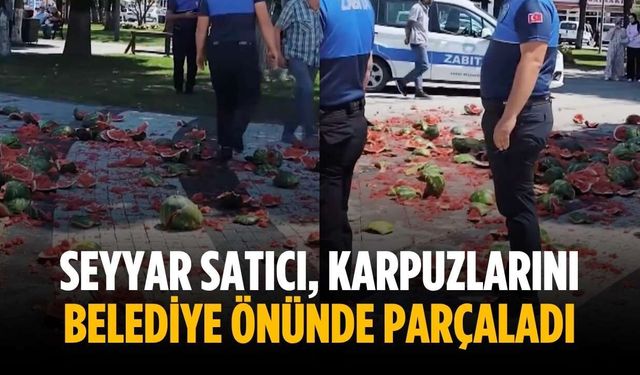 Seyyar satıcı, karpuzlarını belediye önünde parçaladı
