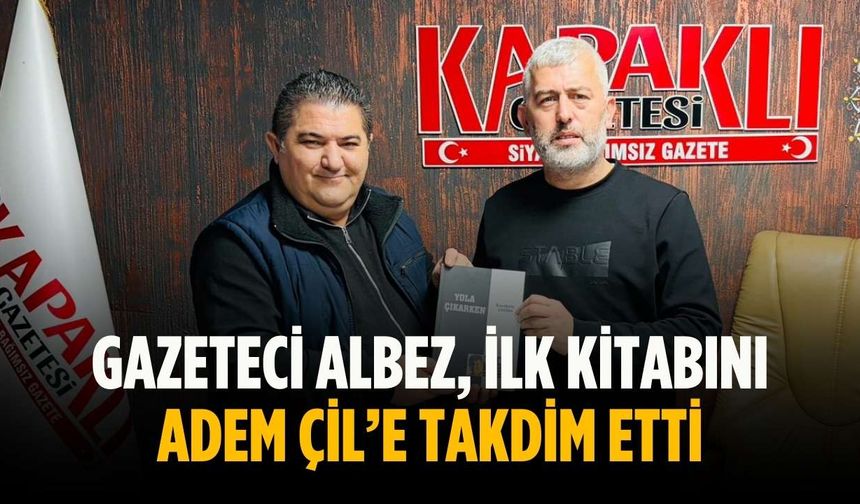 Gazeteci Albez, ilk kitabını Adem Çil’e takdim etti