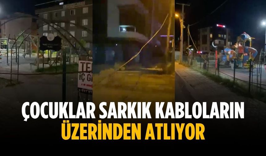 Çocuklar sarkık kabloların üzerinden atlıyor