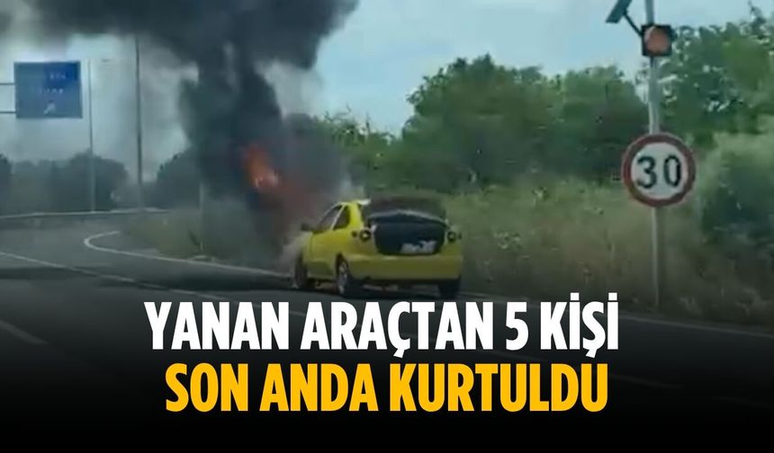 Yanan araçtan 5 kişi son anda kurtuldu